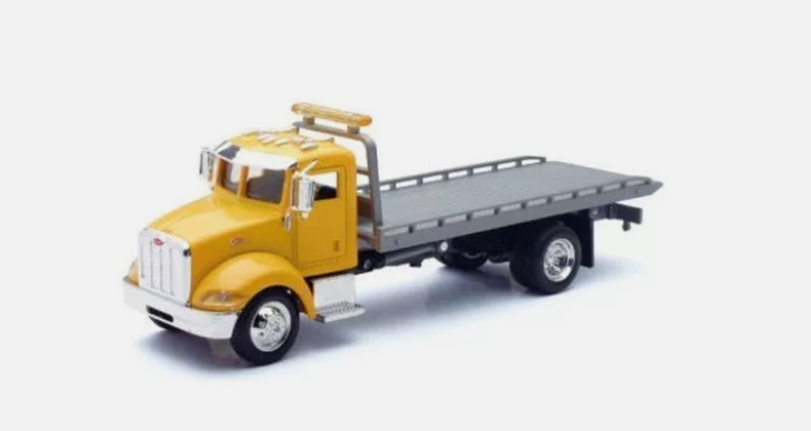 NEW RAY PETERBILT 335 FLAT BED TRUCK LONG HAUL TRUCKER 1:43 SCALE