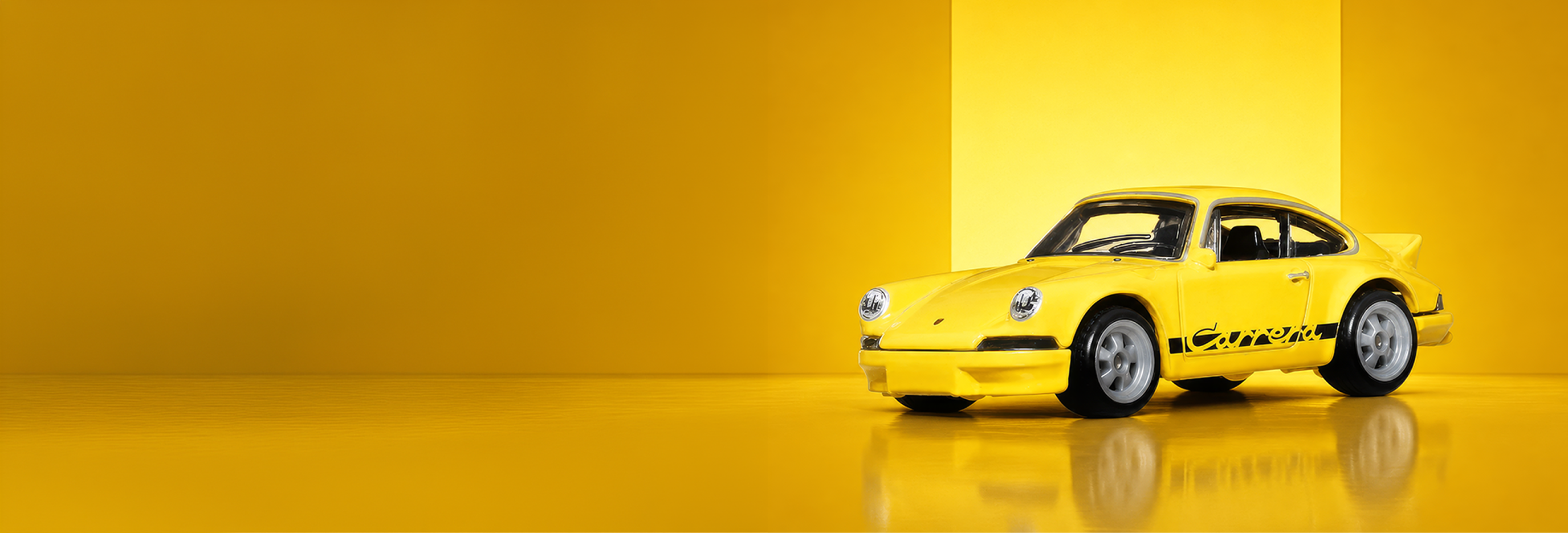 Yellow Porsche Carrera RS